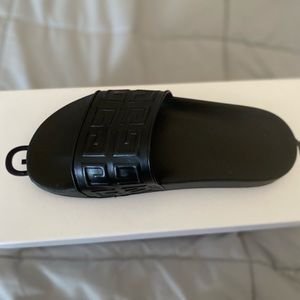 Slightly used black Givenchy slides